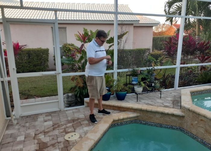 pool inspection Sarasota technician checking pool condition